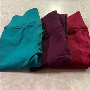 Fabletics  Teal, Purple, and Red Leggings Trio